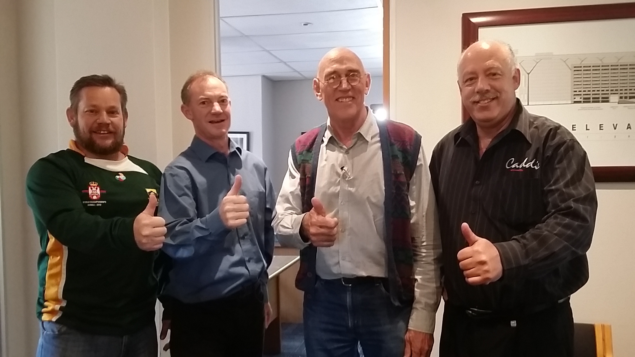 1981 Springboks captain Wynand Claassen, pictured with Caddie CEO Derek Bretherton, Gerhard Mostert and Vic du Preez